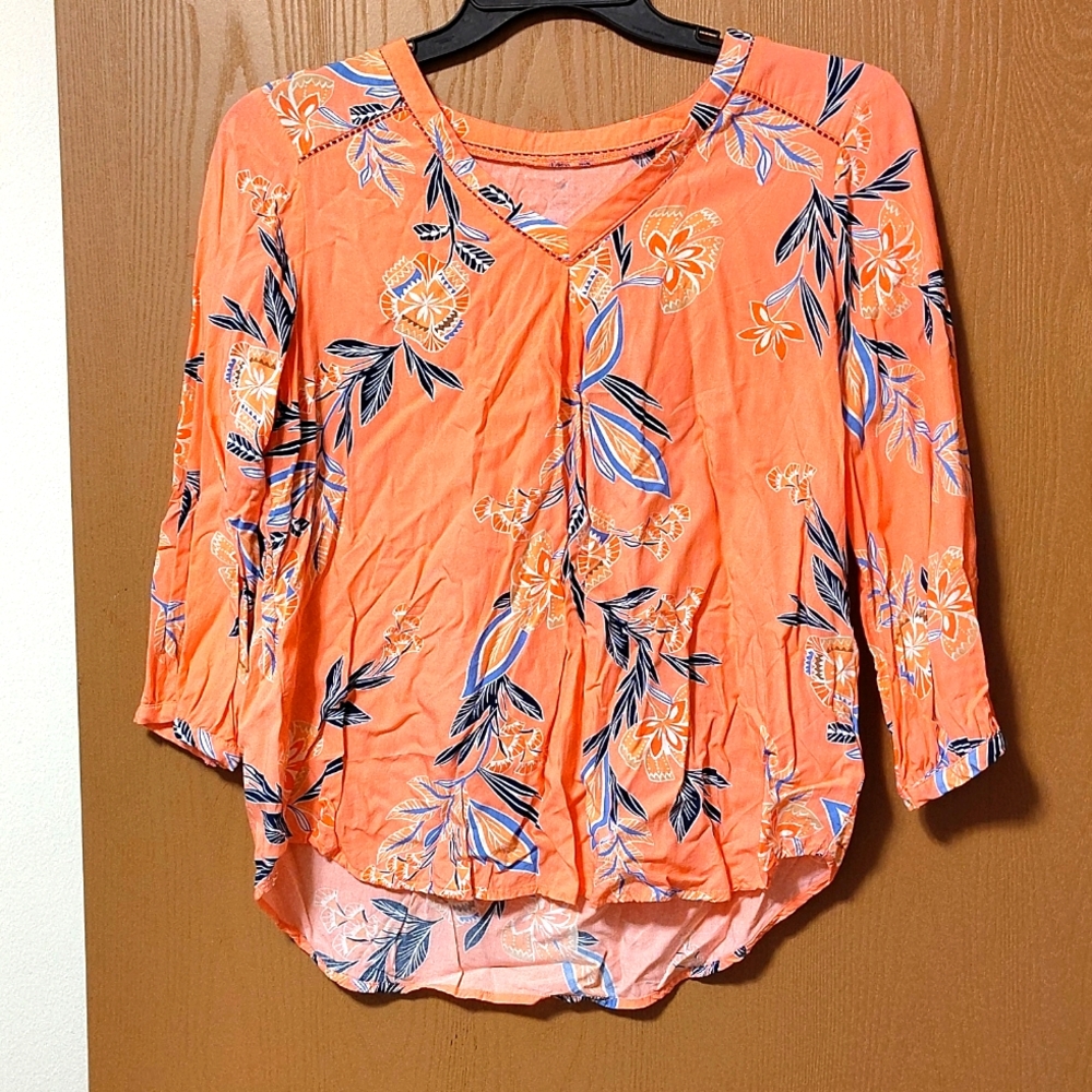 Wrinkly but flattens out fine mid-length sleeve top